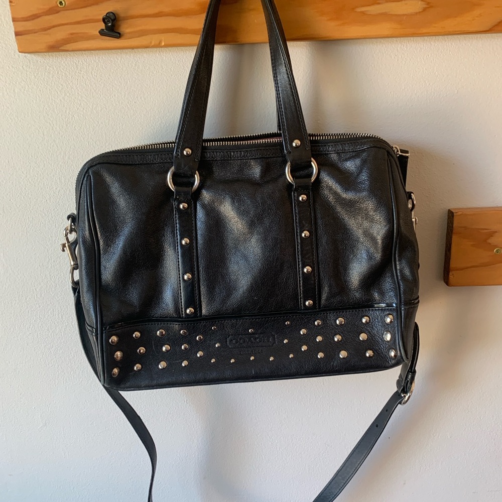 Coach black leather silver studded handbag.